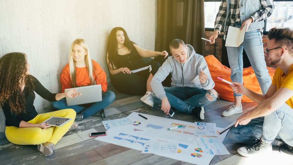 A team working through a planning session together.